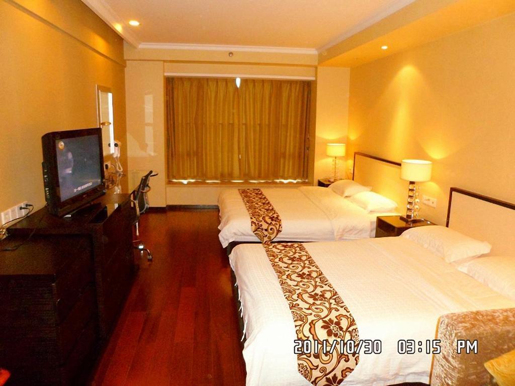 Guangzhou Meiyijia Hotel Apartment Rum bild