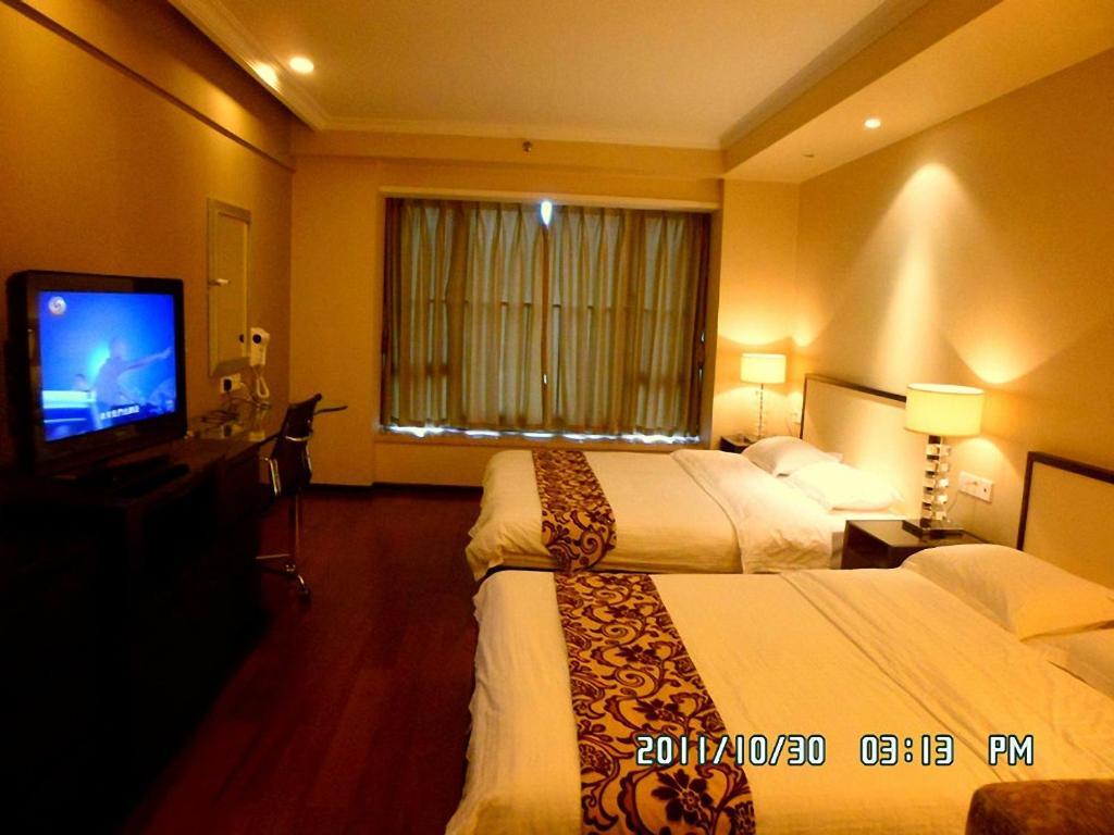 Guangzhou Meiyijia Hotel Apartment Rum bild
