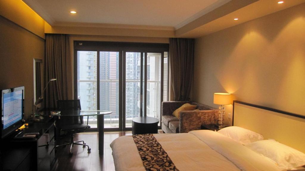 Guangzhou Meiyijia Hotel Apartment Rum bild